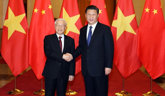 黨中央總書記、國家主席阮富仲（左）與中國共產黨總書記、國家主席習近平。（圖源：越通社）