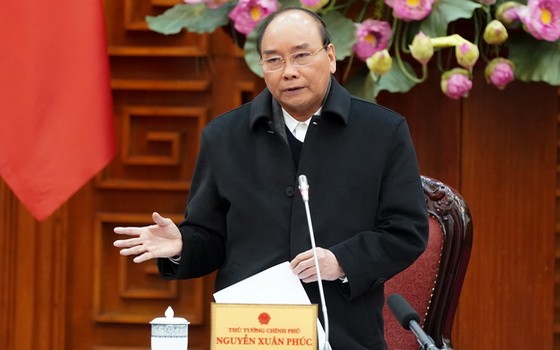 政府總理阮春福在會議上發表指導意見。（圖源：光孝）