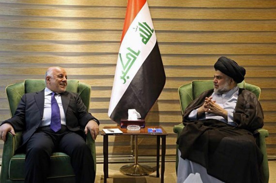 資料圖：伊拉克總理阿巴迪（左）會見薩德爾討論組閣事宜。新華社