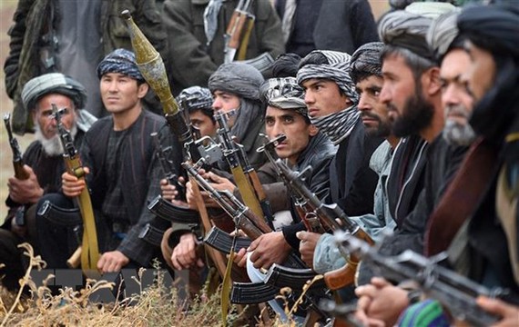 Mỹ tái khởi động đàm phán với Taliban Các tay súng Taliban. Ảnh: TTXVN