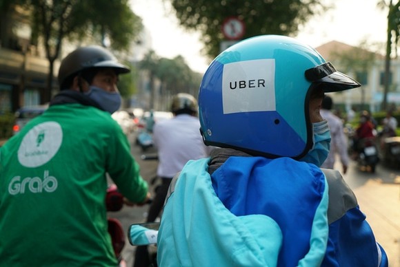 Hoàn tất toàn bộ hồ sơ vụ Grab thâu tóm Uber ảnh 1