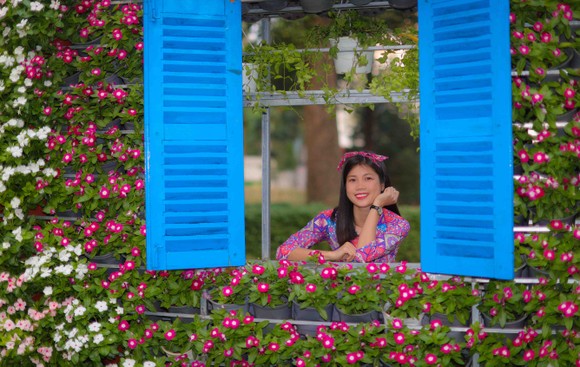 Người đẹp điền kinh Lê Thị Mộng Tuyền thướt tha trong tà áo dài truyền thống du xuân ảnh 16