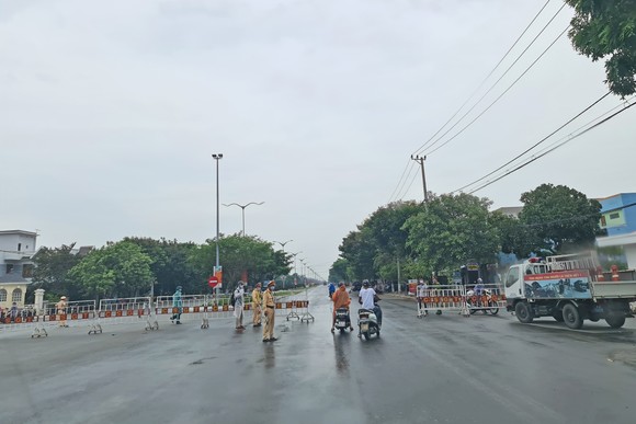 0 giờ ngày 1-8, cách ly xã hội 5 huyện, thị của tỉnh Quảng Nam ảnh 1