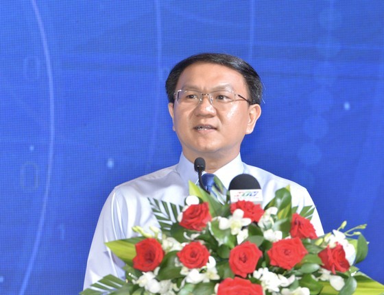 Director of the HCMC Department of Information and Communications Lam Dinh Thang speaks at the opening ceremony. (Photo: SGGP)