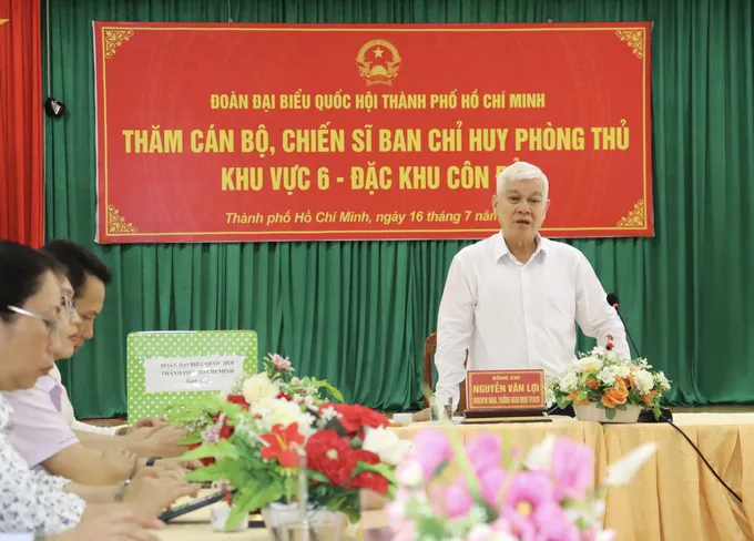 Đồng chí Nguyễn Văn Lợi trao đổi tại buổi gặp gỡ z6809678936951_80c7c0f77855ac16093b77c77605de64.jpg
