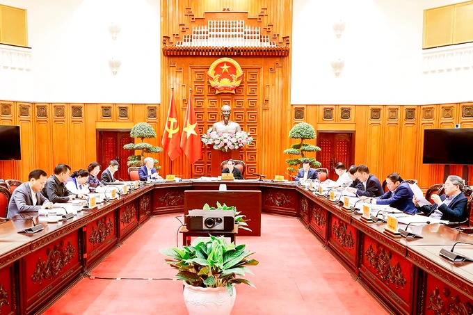 Phiên họp của Ban Thường vụ Đảng ủy Chính phủ về Đề án sắp xếp, tổ chức lại đơn vị hành chính các cấp, chiều 11-3. Ảnh: VIẾT CHUNG L4d.jpg