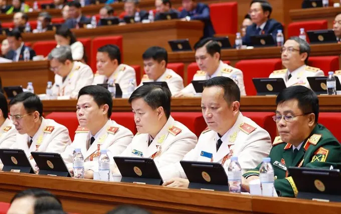 Các đại biểu dự phiên thảo luận chiều 21-1. Ảnh: VIẾT CHUNG