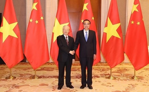 黨中央總書記阮富仲（左）會見中國國務院總理李克強。（圖：越通社）