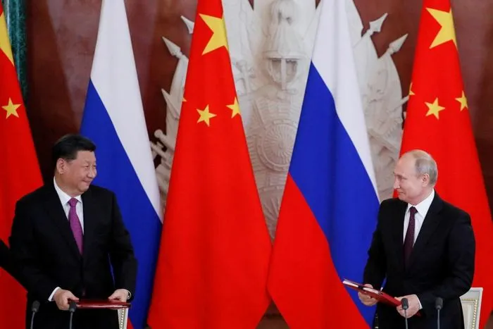 Chủ tịch Trung Quốc Tập Cận Bình và Tổng thống Nga Vladimir Putin ký biên bản ghi nhớ ở Moscow, Nga. Ảnh: Reuters