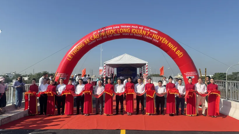 Cắt băng thông xe cầu Phước Long. Ảnh: Đình Dư 51416f4deed753890ac6.jpg
