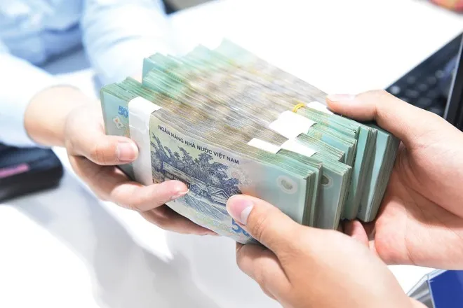 Mức mất giá của VNĐ hiện chỉ còn dưới 1,5% so với đầu năm, vẫn nằm trong “vùng an toàn” của NHNN vay von.jpg