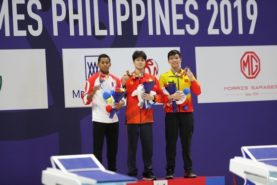 Anh Vien wins sixth gold medal at SEA Games 30 ảnh 1