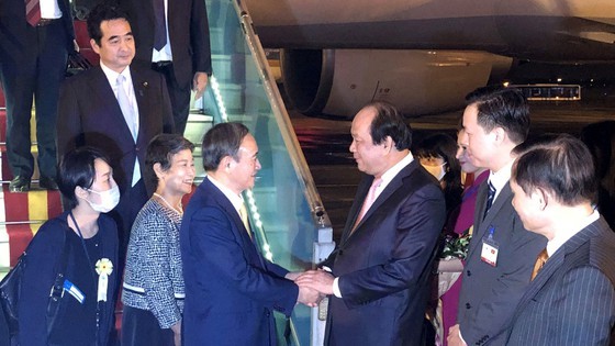 PM Nguyen Xuan Phuc chairs welcome ceremony for his Japanese counterpart ảnh 18