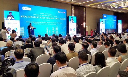 The Chairman of the Hanoi People’s Committee Nguyen Duc Chung delivered his opening speech at the ASOCIO Summit. Photo by Tran Binh