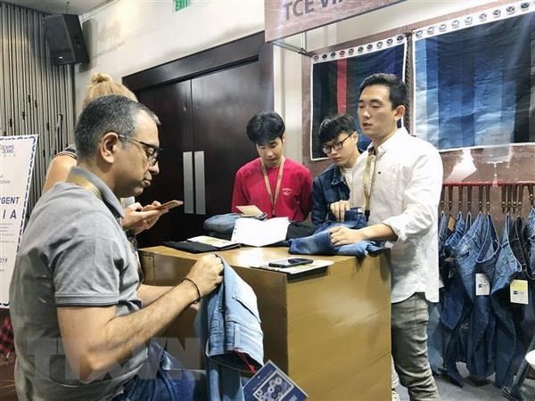 A booth at the Denims and jeans Vietnam exhibition. The denim production sector has high growth potential and is seeing more and more investors, experts say. - VNA Photo My Phương