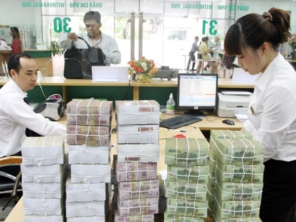 The central bank on Friday held an online conference to prepare for the implementation of the scheme to settle non-performing loans (NPL) and restructure credit institutions in the 2016-20 period. (Photo: vietcombank.com.vn)