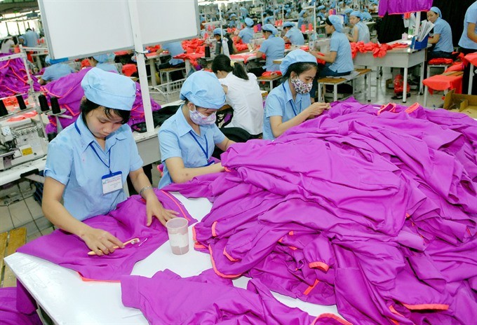 Garment production at the Hoa Tho Textile and Garment JSC’s factory in South Dong Ha Industrial Park, Quang Tri Province. (Photo: VNA/VNS)
