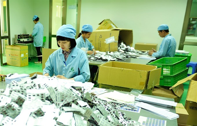 Packaging of tablets at the Sao Kim Pharmaceutical Company Limited’s factory in Hanoi. (Photo: VNA/VNS)