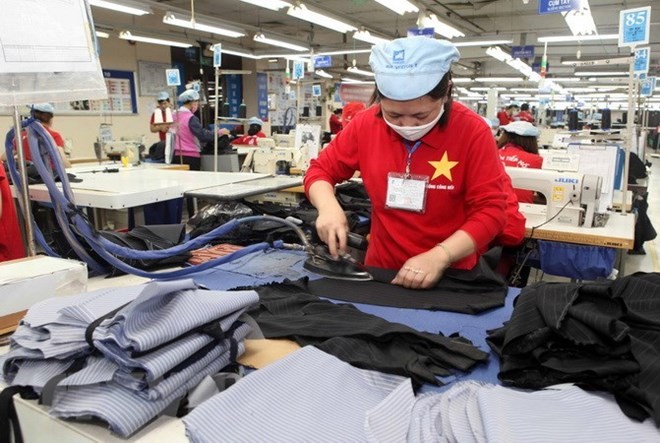Garment and textile exporters benefit a lot from the CPTPP. (Photo: VNA)