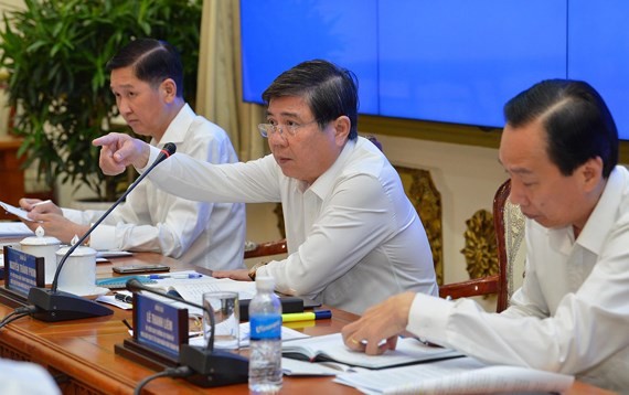 Chairman Nguyen Thanh Phong states at the meeting on June 4 (Photo: SGGP)