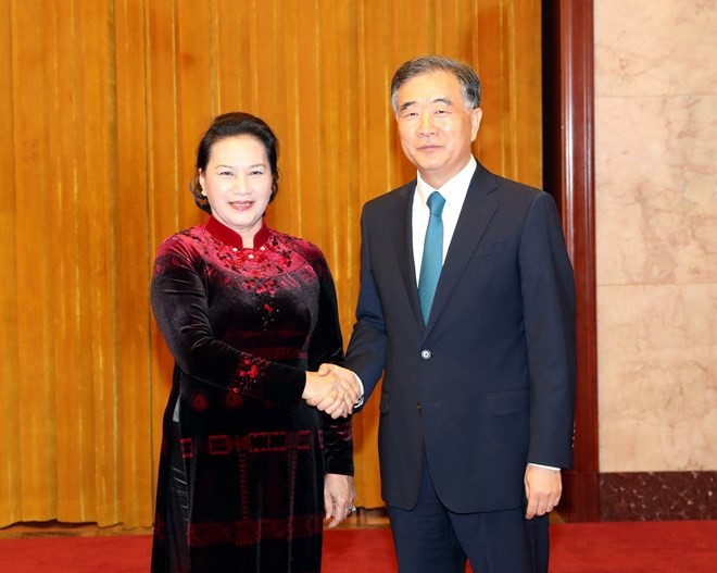 National Assembly Chairwoman Nguyen Thi Kim Ngan (L) meets with Chairman of the Chinese People’s Political Consultative Conference Wang Yang in Beijing on July 12 (Photo: VNA)