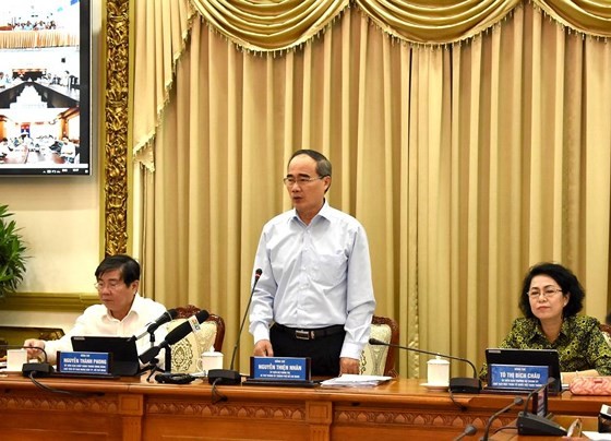HCMC Party Leader Nguyen Thien Nhan makes a statement at the conference on administrative reform on July 18 (Photo: SGGP)