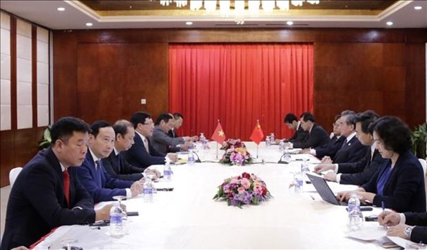 At the meeting between Vietnamese Deputy Prime Minister and Foreign Minister Pham Binh Minh and Chinese State Councilor and Foreign Minister Wang Yi (Photo: VNA)