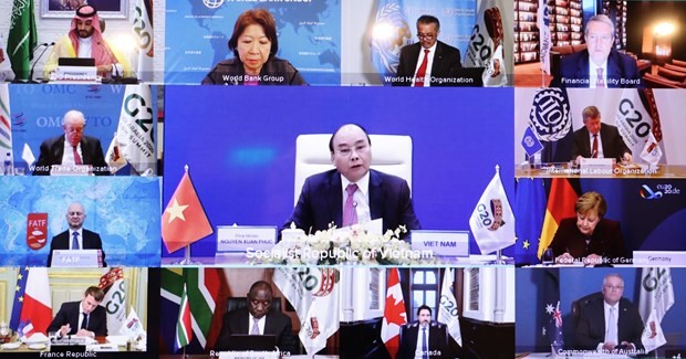 Prime Minister Nguyen Xuan Phuc (centre) speaks at the second online discussion within the framework of the G20 Summit on November 22 (Photo: VNA)