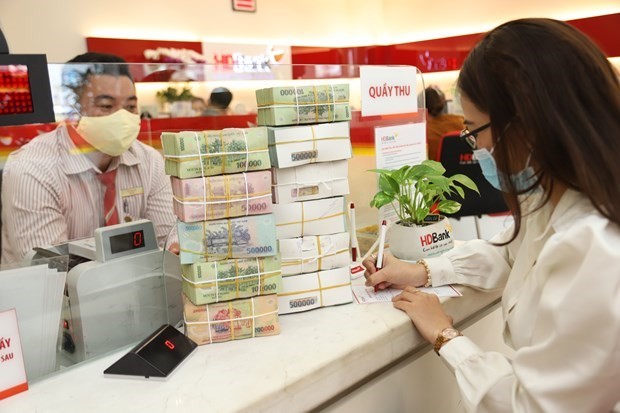 Banks allowed to extend credit growth quota ảnh 1