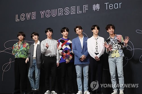 BTS poses for a photo session during a press conference on May 24, 2018. (Yonhap)