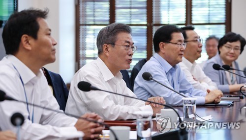 President Moon Jae-in (second from L) speaks in a weekly meeting with his top presidential aides held at his office Cheong Wa Dae in Seoul on Sept. 17, 2018, one day before he was set to embark on a three-day trip to Pyongyang for his third bilateral summ