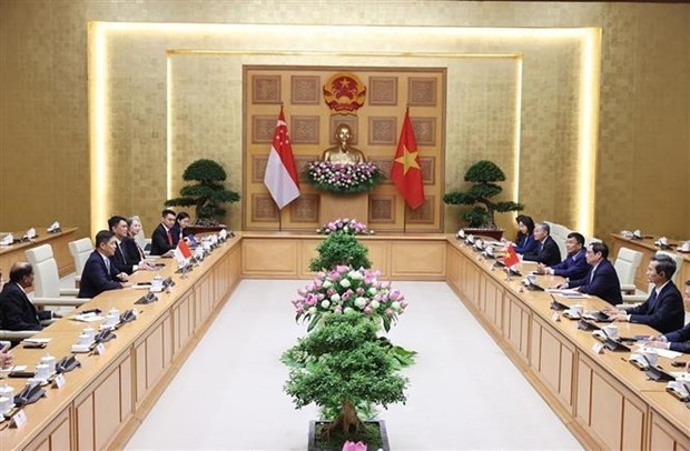 PM Pham Minh Chinh welcomes Speaker of Singaporean Parliament ảnh 2 PM Pham Minh Chinh welcomes Speaker of Singaporean Parliament ảnh 2