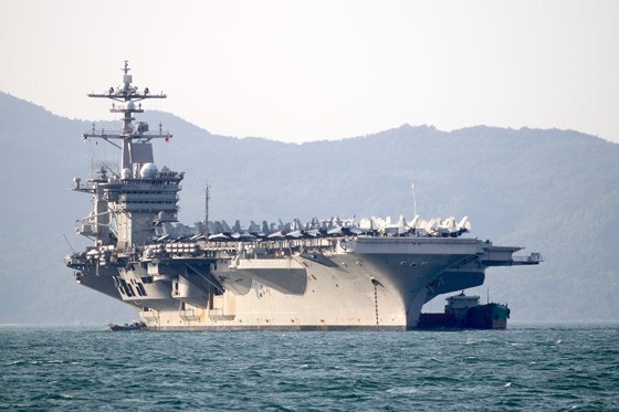 The USS Carl Vinson aircraft carrier docks at Tien Sa Port in the central coastal city of Da Nang.