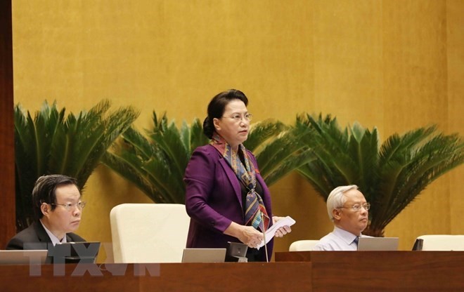 National Assembly Chairwoman Nguyen Thi Kim Ngan (standing) said the NA always listens to opinions from people about draft laws deliberated at the legislature and calls on people nationwide to trust the Party and State (Photo: VNA)