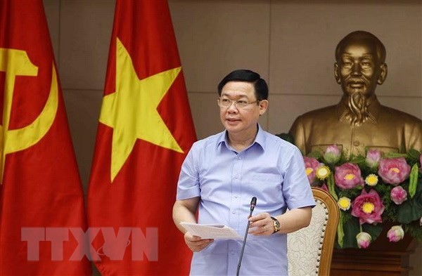 Deputy Prime Minister Vuong Dinh Hue addresses the meeting (Photo: VNA)