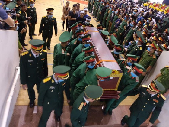 Memorial service held for 22 soldiers buried by landslide ảnh 15 Memorial service held for 22 soldiers buried by landslide ảnh 15