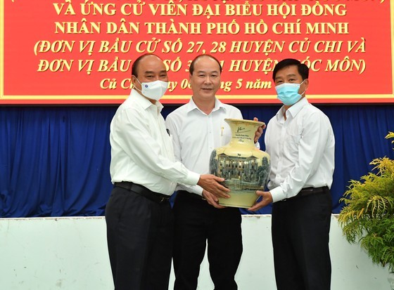 State President holds working session with Cu Chi, Hoc Mon districts in HCMC ảnh 3 State President holds working session with Cu Chi, Hoc Mon districts in HCMC ảnh 3