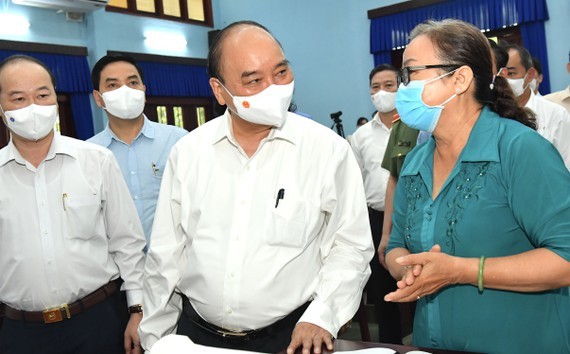 President Phuc calls for investors into Cu Chi, Hoc Mon districts ảnh 6