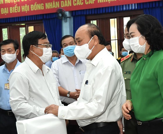 President Phuc calls for investors into Cu Chi, Hoc Mon districts ảnh 8