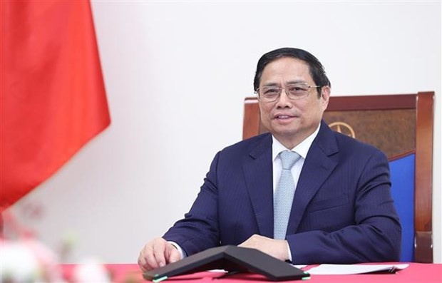 PM holds telephone talks with French counterpart ảnh 1